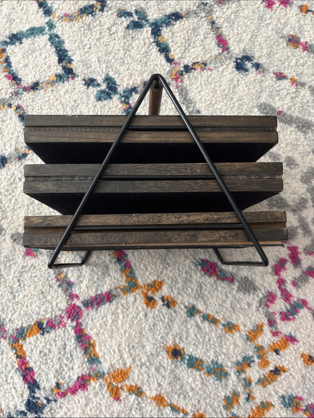 Modern Black Metal Triangle Magazine Rack with Brown Wood Shelves